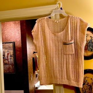 Blush colored rayon sweater.  Sleeveless.
